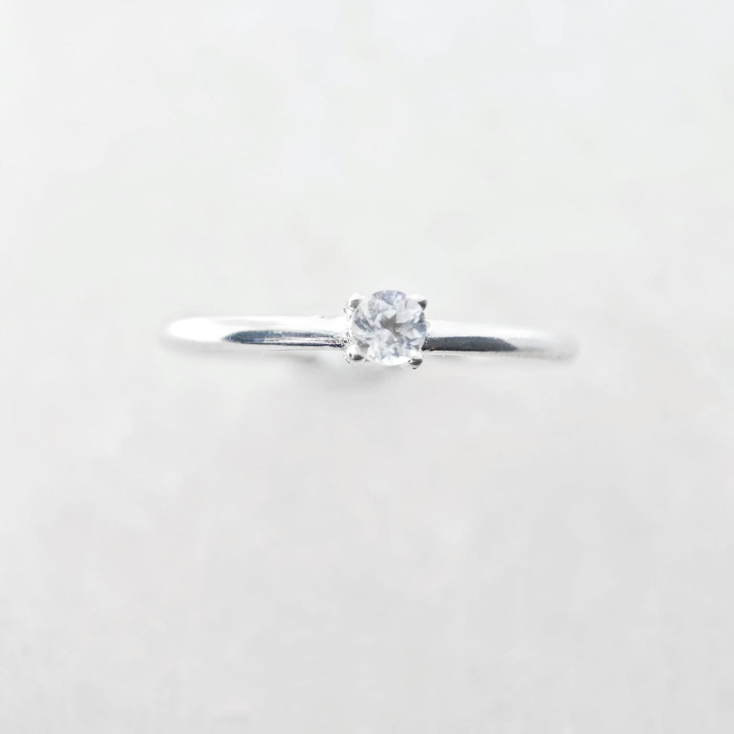 Round April Birthstone White Topaz Ring