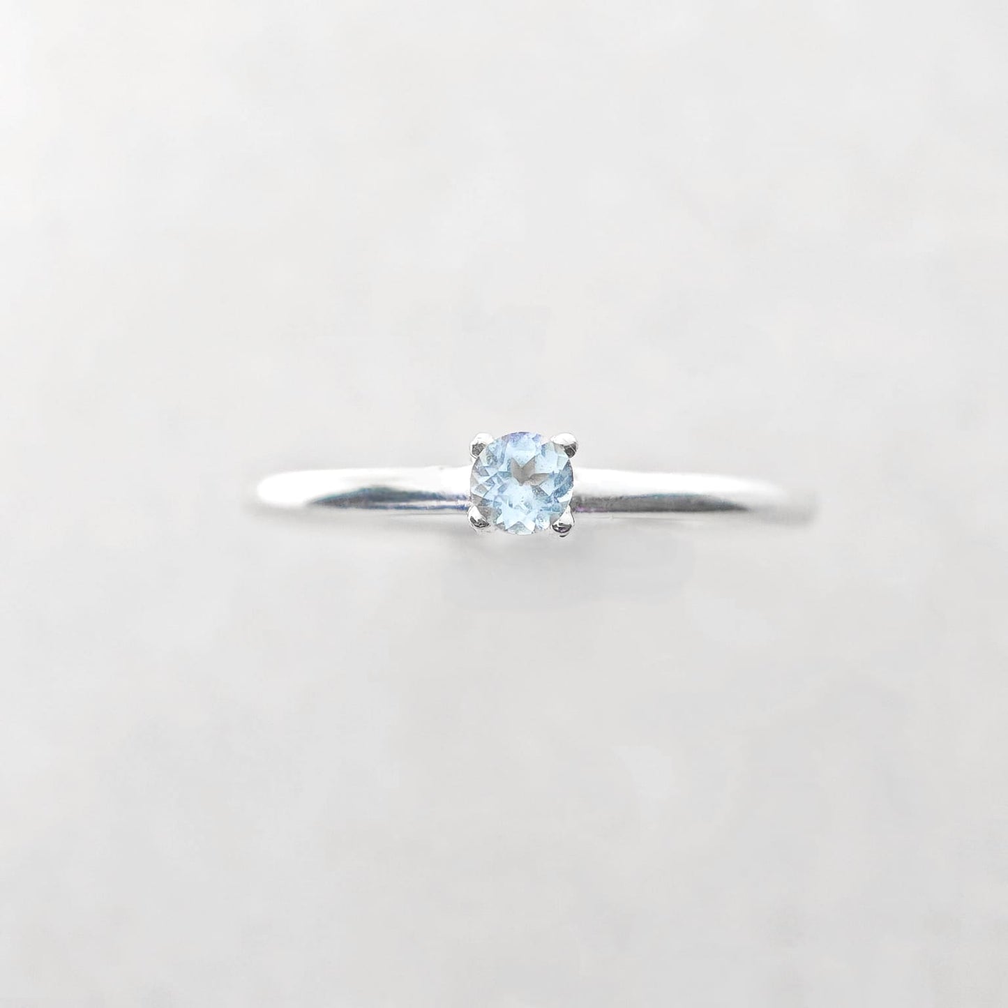 Round November Birthstone Blue Topaz Ring